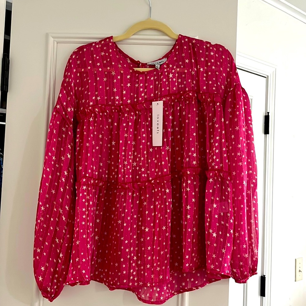 Women’s top . Size medium. Tag still on
